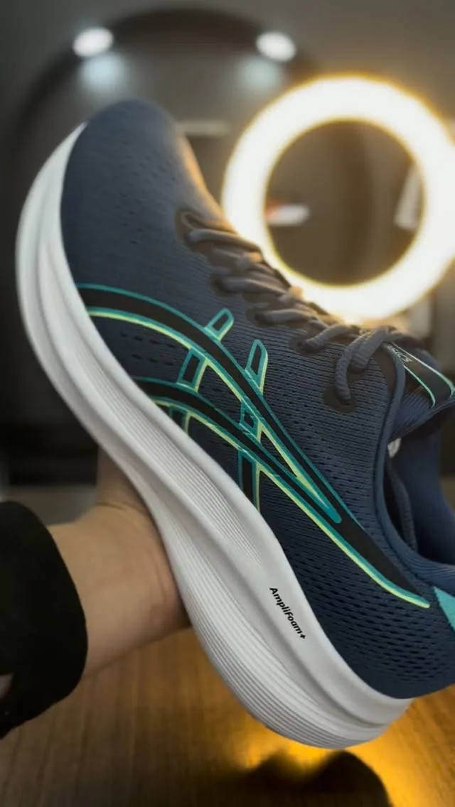 Asics marinho com verde-água