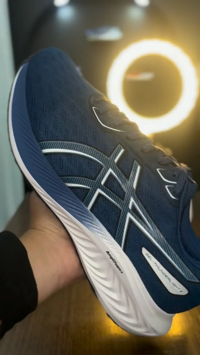 Asics marinho com azul